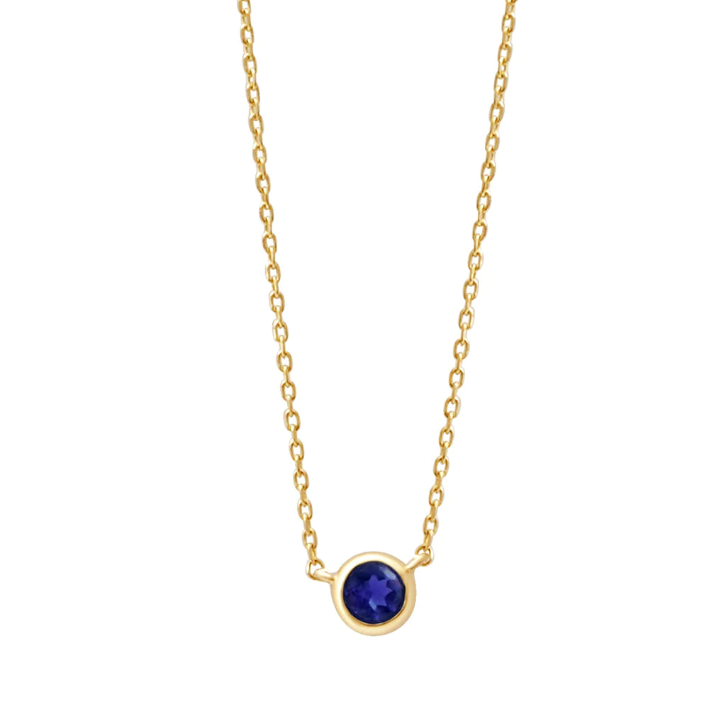 a yellow gold and sapphire birthstone station necklace